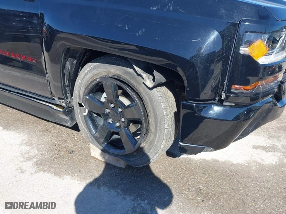 2018 Chevrolet Silverado 1500 Work Truck with VIN 1GCNCNEC1JZ339988, listed as a IAAI auction lot 41725917 with 100,143 mi miles. Bid and sale history available at carsss.com. Image 6.