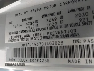 2016 Mazda 6 i Grand Touring with VIN JM1GJ1W57G1403028, listed as a IAAI auction lot 41591235 with 110,079 mi miles and . Bid and sale history available at carsss.com. Image 9.