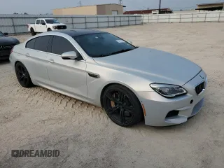 2017 BMW M6 z VIN WBS6E9C56HG437374, wystawiony jako Copart lot #54277624 z przebiegiem 80 858 mil mil oraz . Historia ofert i sprzedaży dostępna na DreamBid. Obrazek 4.