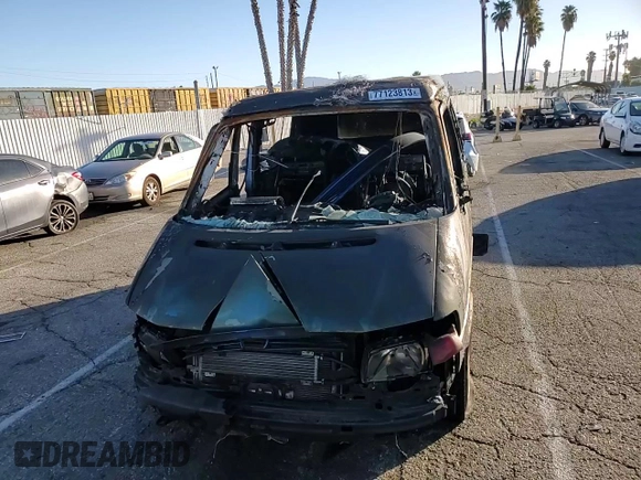 2001 Volkswagen EuroVan MV с VIN WV2NB47061H099148, выставлен на аукционе Copart как лот 77123813 с пробегом Не указан миль и На запчасти • Non repairable. История ставок и продаж доступна на DreamBid. Изображение 11.