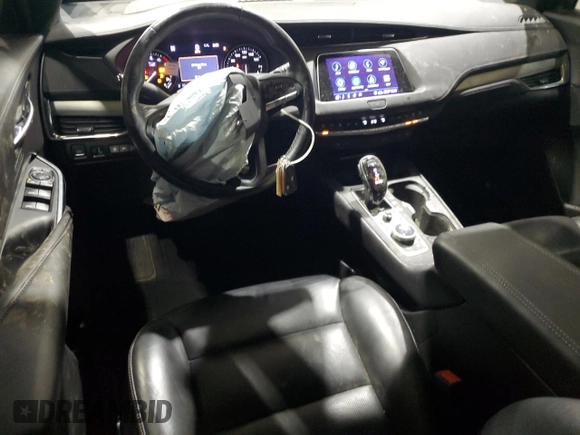 2020 Cadillac XT4 AWD Premium Luxury with VIN 1GYFZDR40LF055380, listed as a Copart auction lot 43933755 with 54,646 mi miles and Salvage Title. Bid and sale history available at DreamBid. Image 8.