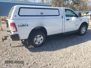 2024 Ram 2500 Tradesman with VIN 3C6MR5AJ2RG251257, listed as a Copart auction lot 50943035 with 7,128 mi miles and Salvage title. Bid and sale history available at DreamBid. Image 3.