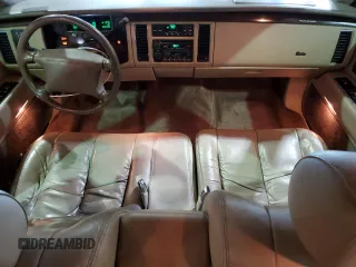 1995 Cadillac Fleetwood z VIN 1G6DW52P5SR715543, wystawiony jako Copart lot #51841755 z przebiegiem 92 222 mil mil oraz Czysty tytuł • Clean title. Historia ofert i sprzedaży dostępna na DreamBid. Obrazek 8.
