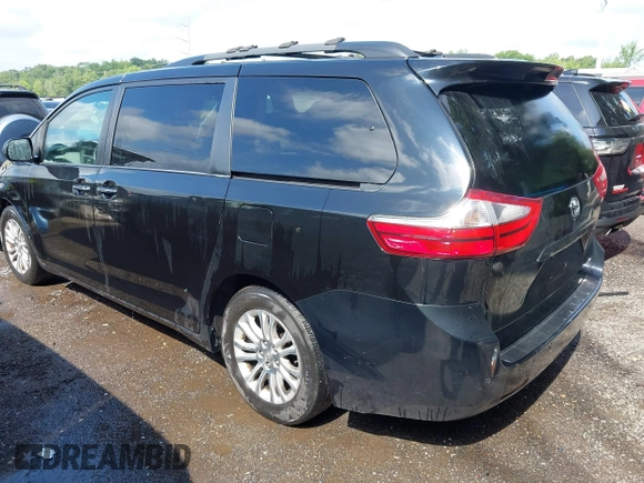 2015 Toyota Sienna XLE with VIN 5TDYK3DC8FS574645, listed as a IAAI auction lot 42528851 with 164,408 mi miles and . Bid and sale history available at DreamBid. Image 3.