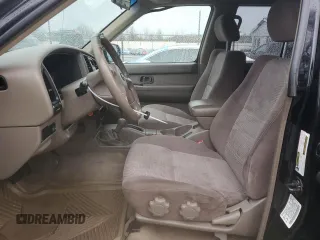 2004 Nissan Pathfinder SE with VIN JN8DR09Y44W911455, listed as a Copart auction lot 48134835 with 198,794 mi miles and Salvage title. Bid and sale history available at DreamBid. Image 7.