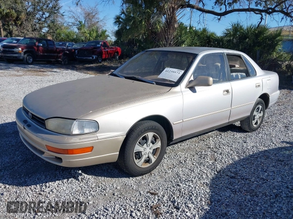 1994 Toyota Camry LE with VIN 4T1SK12E9RU351895, listed as a IAAI auction lot 41239573 with 184,866 mi miles. Bid and sale history available at carsss.com. Image 2.