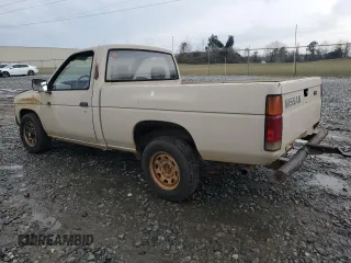 1986 Nissan Hardbody E z VIN JN6ND11S7GW014787, wystawiony jako Copart lot #45291425 z przebiegiem 171 557 mil mil oraz Szkody całkowita. Historia ofert i sprzedaży dostępna na DreamBid. Obrazek 2.