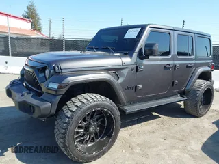 2021 Jeep Wrangler Unlimited Willys с VIN 1C4HJXDG7MW576798, выставлен на аукционе IAAI как лот 42471651 с пробегом 58 481 миль миль и . История ставок и продаж доступна на DreamBid. Изображение 2.