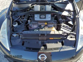 2014 Nissan 370Z Touring with VIN JN1AZ4FH3EM620195, listed as a Copart auction lot 83207104 with 66,974 mi miles and Salvage Title. Bid and sale history available at DreamBid. Image 13.
