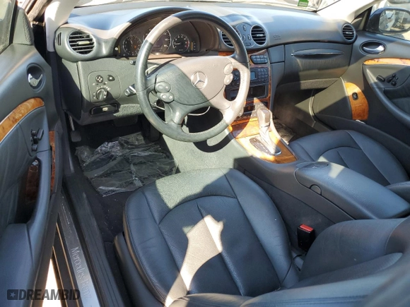 2003 Mercedes-Benz CLK-Class 5.0L with VIN WDBTJ75JX3F039229, listed as a Copart auction lot 77006714 with 111,617 mi miles and Salvage Title. Bid and sale history available at carsss.com. Image 8.
