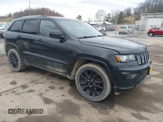 2018 Jeep Grand Cherokee Laredo E with VIN 1C4RJFAG3JC324434, listed as a IAAI auction lot 41812311 with 140,820 mi miles. Bid and sale history available at carsss.com. Image 1.