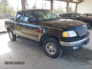 2002 Ford F-150 XLT with VIN 1FTRW08L92KD75087, listed as a IAAI auction lot 41960331 with 1 mi miles. Bid and sale history available at carsss.com. Image 1.