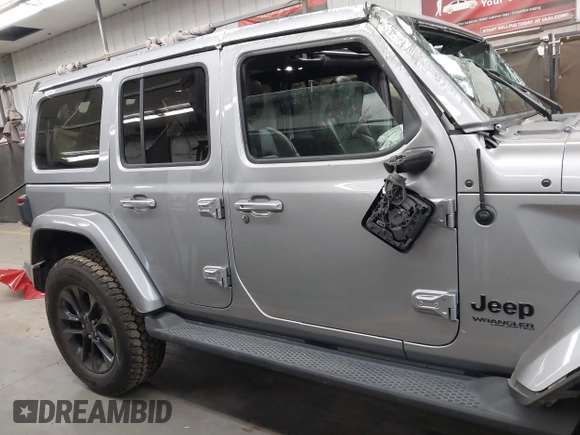 2021 Jeep Wrangler Unlimited Sahara with VIN 1C4HJXEN1MW529568, listed as a IAAI auction lot 42336590 with 39,931 mi miles and . Bid and sale history available at DreamBid. Image 14.