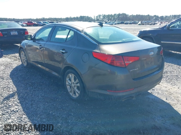 2013 Kia Optima EX with VIN 5XXGN4A74DG174838, listed as a IAAI auction lot 41621839 with 227,173 mi miles. Bid and sale history available at carsss.com. Image 3.