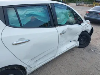 2015 Nissan LEAF SL z VIN 1N4AZ0CP2FC312062, wystawiony jako IAAI lot #42069975 z przebiegiem 250 000 mil mil oraz . Historia ofert i sprzedaży dostępna na DreamBid. Obrazek 6.