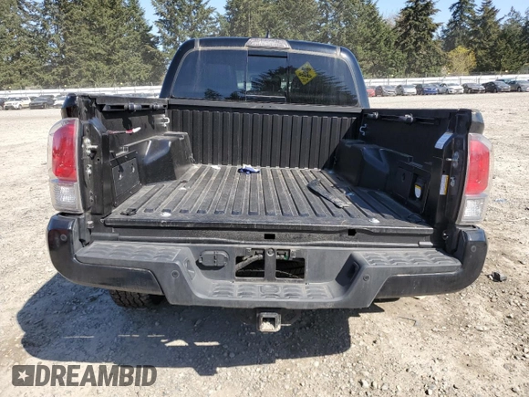 2018 Toyota Tacoma SR with VIN 3TMGZ5AN6JM163097, listed as a Copart auction lot 52633665 with 39,910 mi miles and Salvage Title. Bid and sale history available at DreamBid. Image 6.