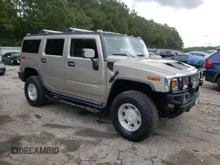 2003 Hummer H2 with VIN 5GRGN23U73H147303, listed as a Copart auction lot 72598604 with 0 mi miles and Clean Title. Bid and sale history available at carsss.com. Image 4.