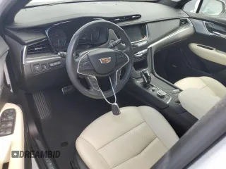 2023 Cadillac XT5 AWD Sport with VIN 1GYKNGRS4PZ191199, listed as a Copart auction lot 74790394 with 17,281 mi miles and Non repairable. Bid and sale history available at DreamBid. Image 8.