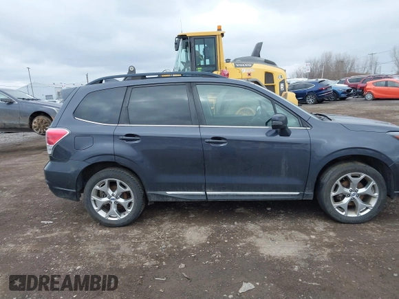 2017 Subaru Forester Touring with VIN JF2SJATC5HH518783, listed as a IAAI auction lot 41889172 with 115,801 mi miles and . Bid and sale history available at DreamBid. Image 12.
