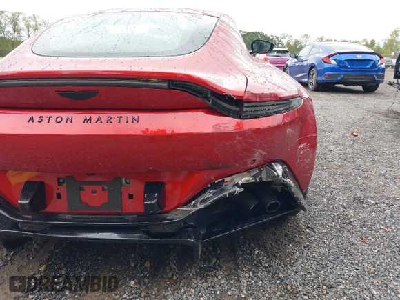 2023 Aston Martin Vantage z VIN SCFSMGAW8PGN08275, wystawiony jako IAAI lot #40460970 z przebiegiem 2 602 mil mil oraz . Historia ofert i sprzedaży dostępna na DreamBid. Obrazek 21.