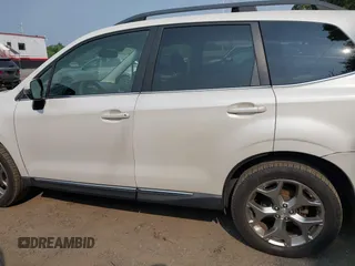 2015 Subaru Forester Touring with VIN JF2SJAWC9FH573973, listed as a IAAI auction lot 42380080 with 87,938 mi miles and . Bid and sale history available at DreamBid. Image 14.