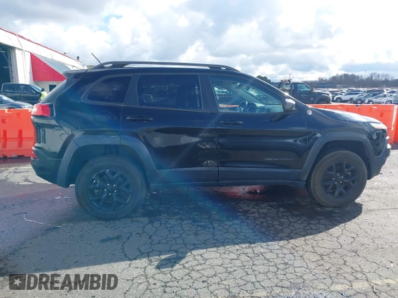 2015 Jeep Cherokee Trailhawk with VIN 1C4PJMBS7FW699392, listed as a IAAI auction lot 41797617 with 1 mi miles. Bid and sale history available at carsss.com. Image 13.