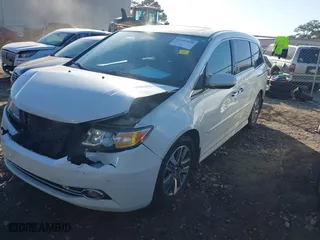 2015 Honda Odyssey Touring Elite with VIN 5FNRL5H90FB001643, listed as a IAAI auction lot 41487890 with NaN miles. Bid and sale history available at carsss.com. Image 17.