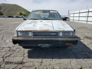 1986 Toyota Camry z VIN JT2SV16E6G0520922, wystawiony jako Copart lot #47146675 z przebiegiem 156 394 mil mil oraz Szkoda całkowita • Salvage title. Historia ofert i sprzedaży dostępna na DreamBid. Obrazek 5.