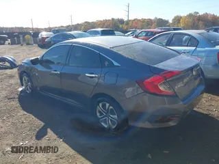 2017 Honda Civic Sedan LX with VIN 19XFC2F53HE204794, listed as a IAAI auction lot 40636416 with 134,629 mi miles. Bid and sale history available at carsss.com. Image 3.