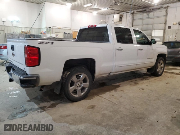 2018 Chevrolet Silverado 1500 LT with VIN 1GCUKREC8JF200108, listed as a Copart auction lot 44582405 with 126,169 mi miles and Salvage Title. Bid and sale history available at DreamBid. Image 3.