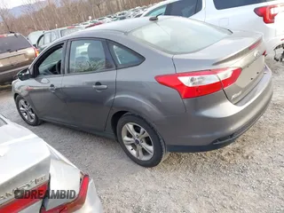 2013 Ford Focus SE with VIN 1FADP3F23DL242069, listed as a IAAI auction lot 41781817 with 265,630 mi miles. Bid and sale history available at carsss.com. Image 3.