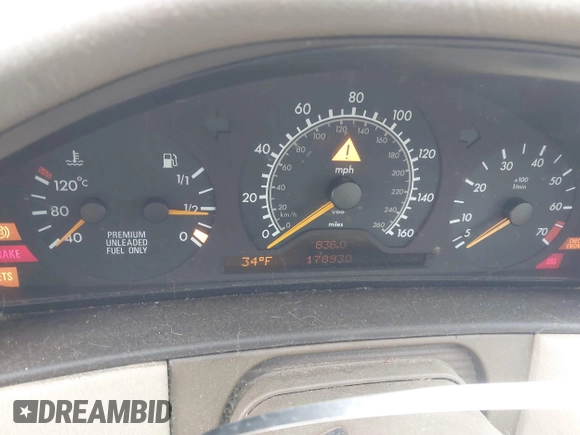 1996 Mercedes-Benz E-Class with VIN WDBJF55F5TJ007150, listed as a IAAI auction lot 41518340 with 178,930 mi miles. Bid and sale history available at carsss.com. Image 7.