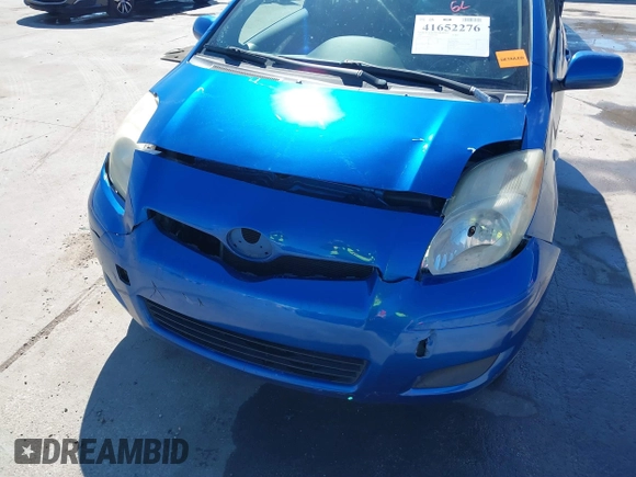 2010 Toyota Yaris z VIN JTDJT4K36A5290047, wystawiony jako IAAI lot #41652276 z przebiegiem 185 017 mil mil oraz . Historia ofert i sprzedaży dostępna na DreamBid. Obrazek 6.