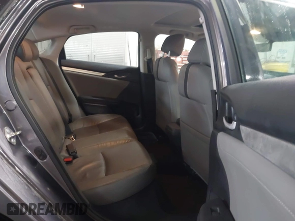 2020 Honda Civic EX-L with VIN 19XFC1F70LE010163, listed as a IAAI auction lot 41306532 with 88,767 mi miles and . Bid and sale history available at DreamBid. Image 8.