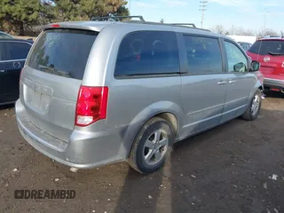 2013 Dodge Grand Caravan SXT with VIN 2C4RDGCG8DR551723, listed as a IAAI auction lot 41510574 with 183,432 mi miles and . Bid and sale history available at DreamBid. Image 4.