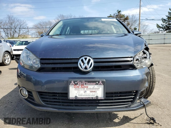 2014 Volkswagen Golf TDI w/Sunroof & Nav с VIN WVWDM7AJ9EW006745, выставлен на аукционе Copart как лот 51076805 с пробегом 94 761 миль миль и Списание • Salvage title. История ставок и продаж доступна на DreamBid. Изображение 5.
