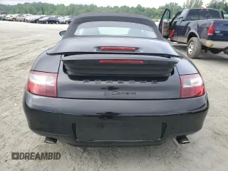 1999 Porsche 911 z VIN WP0CA2997XS656332, wystawiony jako Copart lot #59492395 z przebiegiem Nie podano mil oraz Szkoda całkowita • Salvage title. Historia ofert i sprzedaży dostępna na DreamBid. Obrazek 6.