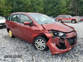 2012 Mazda 5 Sport with VIN JM1CW2BL4C0128082, listed as a Copart auction lot 67080914 with Not Provided miles and Salvage Title. Bid and sale history available at DreamBid. Image 4.