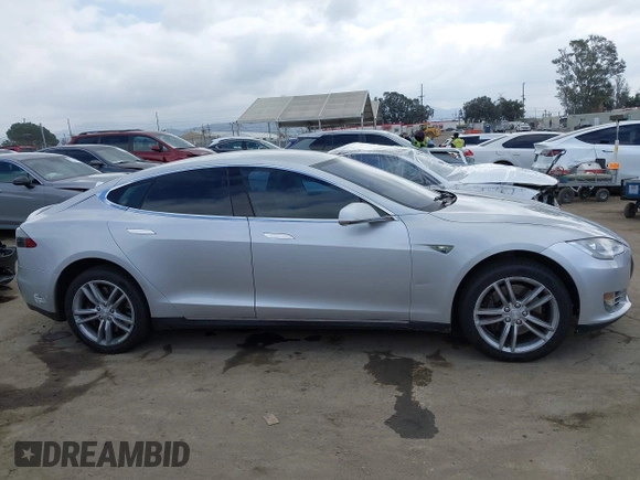 2013 Tesla Model S with VIN 5YJSA1DG7DFP11382, listed as a IAAI auction lot 42056169 with 126,975 mi miles. Bid and sale history available at carsss.com. Image 13.
