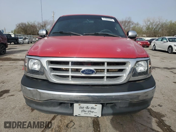 2001 Ford F-150 XLT z VIN 1FTRW07L41KF97200, wystawiony jako Copart lot #51093245 z przebiegiem 227 310 mil mil oraz Szkoda całkowita • Salvage title. Historia ofert i sprzedaży dostępna na DreamBid. Obrazek 5.
