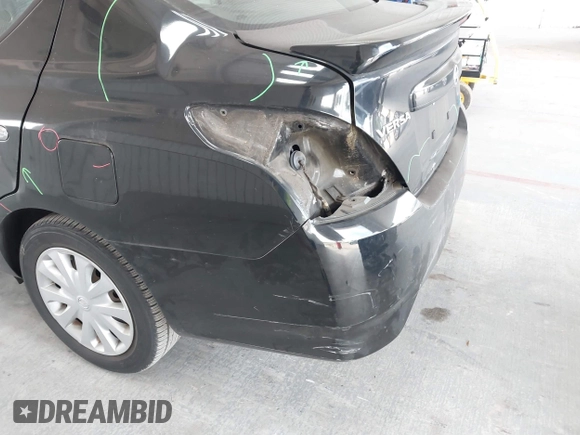 2016 Nissan Versa SV with VIN 3N1CN7AP5GL869163, listed as a IAAI auction lot 42121267 with 106,680 mi miles and . Bid and sale history available at DreamBid. Image 6.
