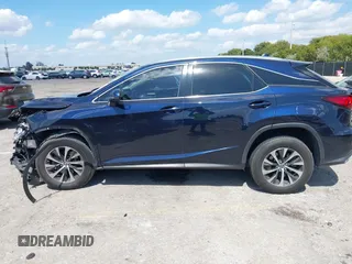 2020 Lexus RX with VIN 2T2AZMAA8LC177233, listed as a IAAI auction lot 41708568 with 62,778 mi miles. Bid and sale history available at carsss.com. Image 14.