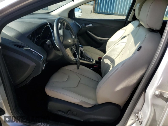 2017 Ford Focus Titanium with VIN 1FADP3N21HL279810, listed as a Copart auction lot 57950195 with 121,139 mi miles and Salvage title. Bid and sale history available at DreamBid. Image 7.