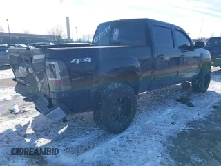 2013 GMC Sierra 1500 SLT with VIN 3GTP2WE79DG377543, listed as a IAAI auction lot 41407899 with 101,827 mi miles and . Bid and sale history available at DreamBid. Image 4.
