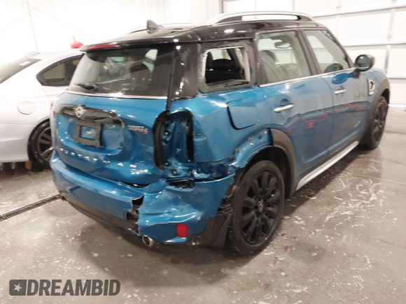 2020 MINI Countryman Cooper S with VIN WMZYX1C01L3L57027, listed as a IAAI auction lot 41270859 with 38,150 mi miles and . Bid and sale history available at DreamBid. Image 6.