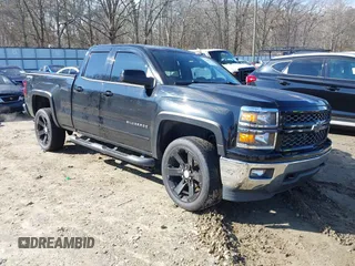2015 Chevrolet Silverado 1500 LT with VIN 1GCVKREC3FZ200690, listed as a IAAI auction lot 41305420 with 202,784 mi miles. Bid and sale history available at carsss.com. Image 1.