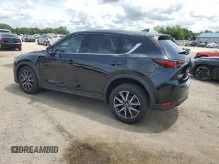 2018 Mazda CX-5 Grand Touring с VIN JM3KFBDM0J0362967, выставлен на аукционе Copart как лот 60288665 с пробегом 137 241 миль миль и Списание • Salvage title. История ставок и продаж доступна на DreamBid. Изображение 2.