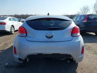 2012 Hyundai Veloster w/Black Int with VIN KMHTC6AD7CU063968, listed as a IAAI auction lot 41764263 with 83,634 mi miles and . Bid and sale history available at DreamBid. Image 16.