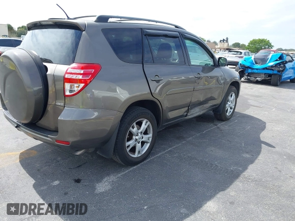 2012 Toyota RAV4 with VIN 2T3BF4DV4CW237305, listed as a IAAI auction lot 41590091 with 114,757 mi miles and . Bid and sale history available at carsss.com. Image 4.