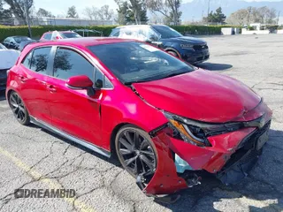 2021 Toyota Corolla Hatchback SE with VIN JTND4MBE1M3110769, listed as a IAAI auction lot 41874276 with 44,964 mi miles. Bid and sale history available at carsss.com. Image 1.